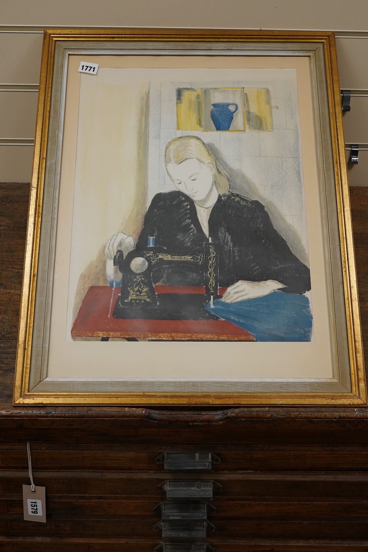 Lennart Gram (Swedish, 1910-1996), Woman using a sewing machine, unsigned, artist's details verso, colour lithograph, 47 x 36cm